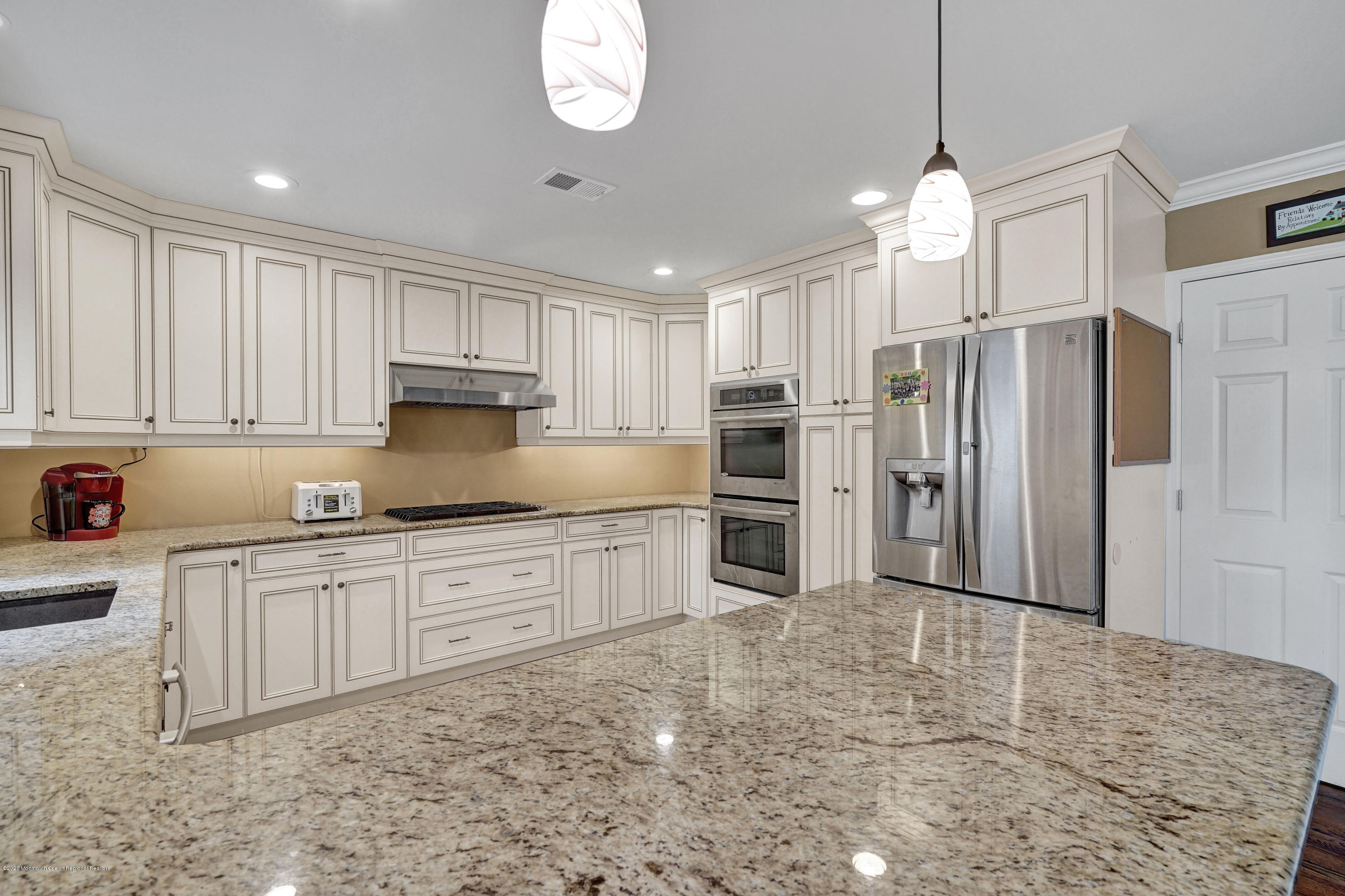 712 Midstreams Road Brick, NJ 08724 - Photo 10 of 33 a large kitchen with cabinets and stainless steel appliances
