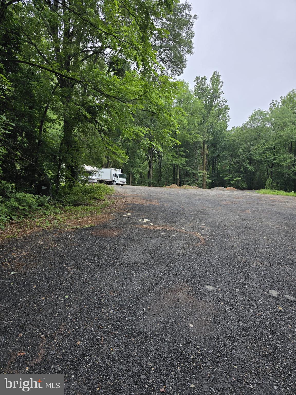 4411 Largo Road Upper Marlboro, MD 20772 - Photo 3 of 12 a view of an outdoor space with trees