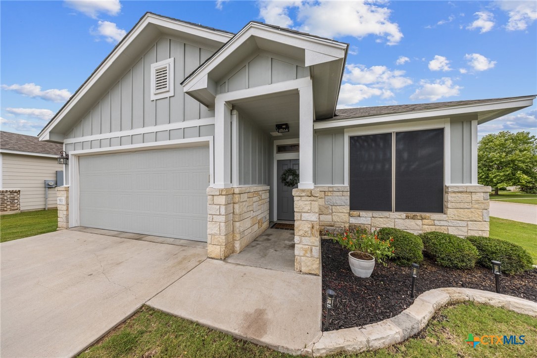 7513 Hudson Grove Drive Temple, TX 76502 - Photo 2 of 38 a front view of a house with garden