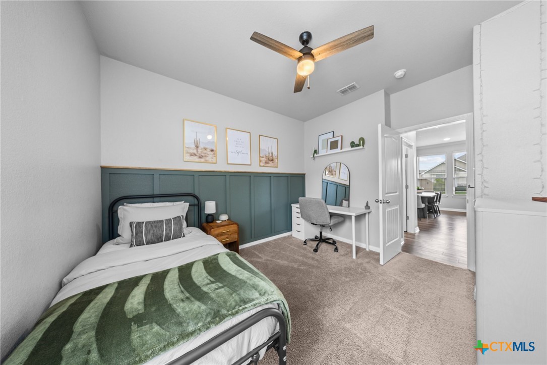 7513 Hudson Grove Drive Temple, TX 76502 - Photo 24 of 38 a living room with furniture and a fireplace