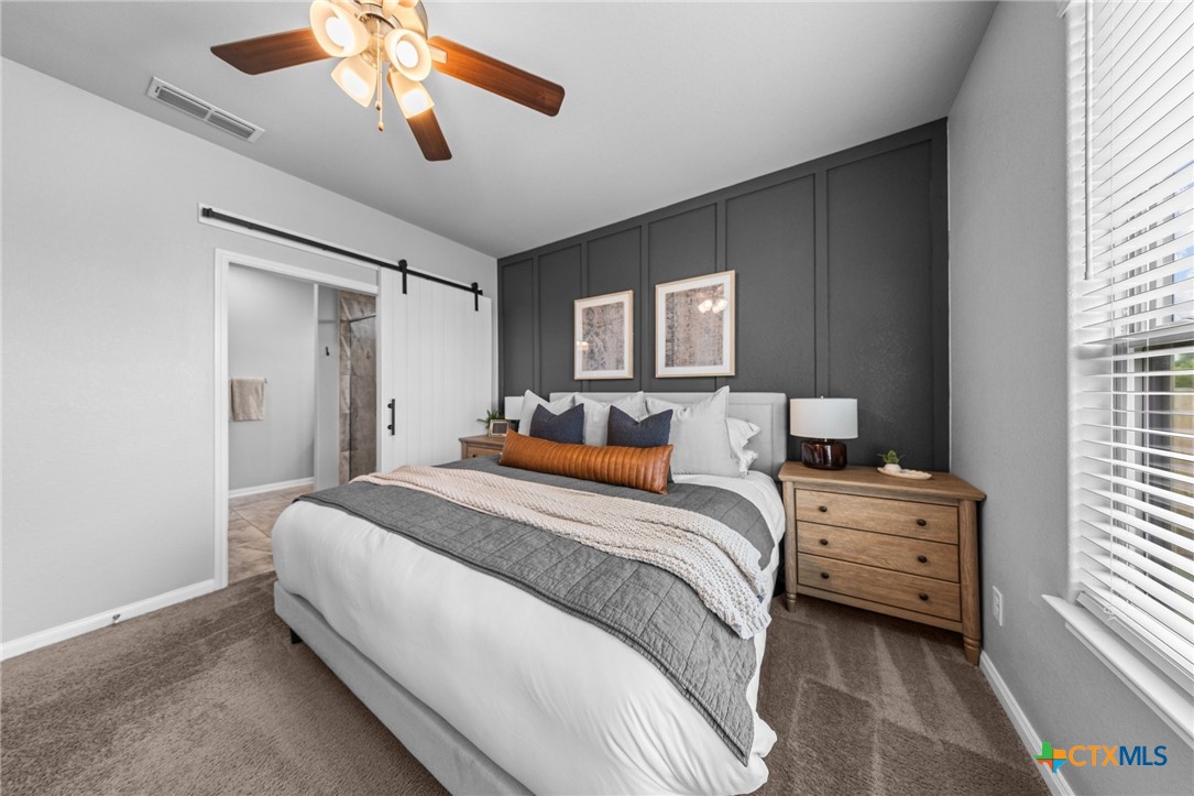 7513 Hudson Grove Drive Temple, TX 76502 - Photo 26 of 38 a bedroom with bed and a window