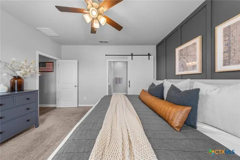 a living room with furniture and a couch