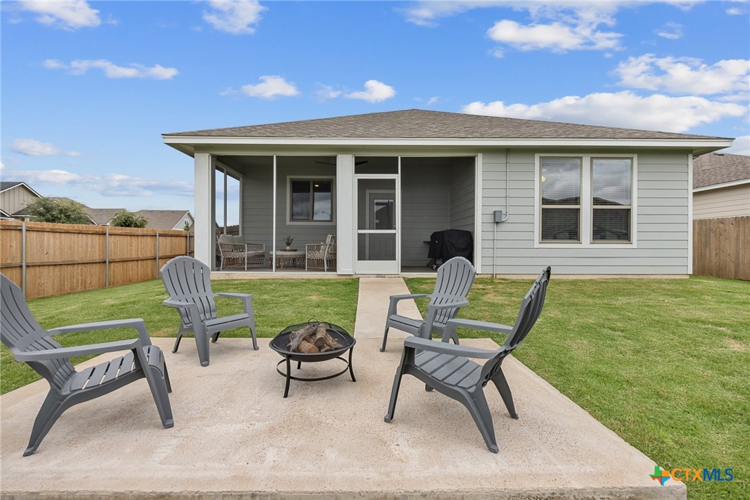 7513 Hudson Grove Drive Temple, TX 76502 - Photo 35 of 38 a view of a house with a backyard and sitting area