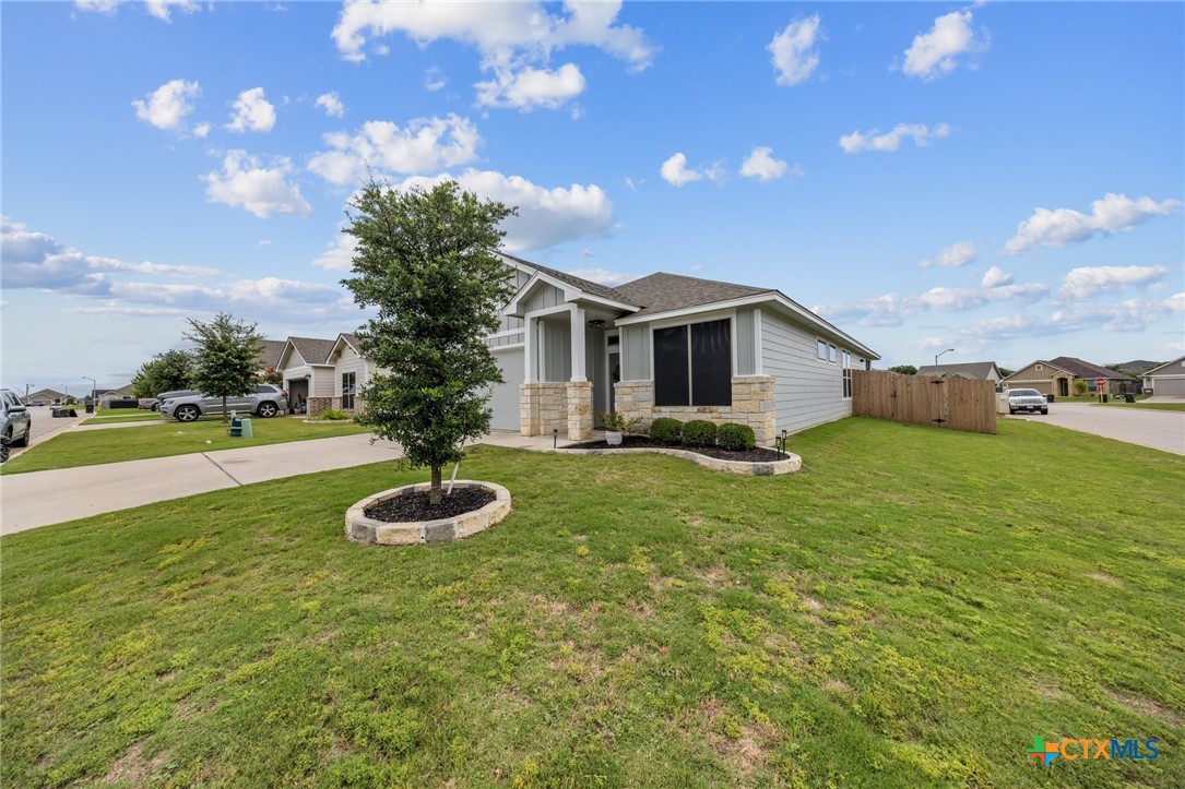 7513 Hudson Grove Drive Temple, TX 76502 - Photo 4 of 38 a front view of house with yard and green space