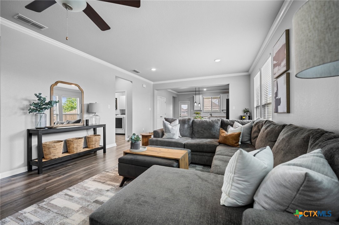 7513 Hudson Grove Drive Temple, TX 76502 - Photo 10 of 38 a living room with furniture and a fireplace