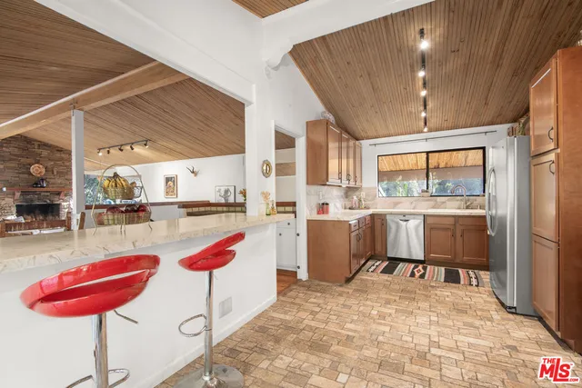 a view of a terrace with furniture