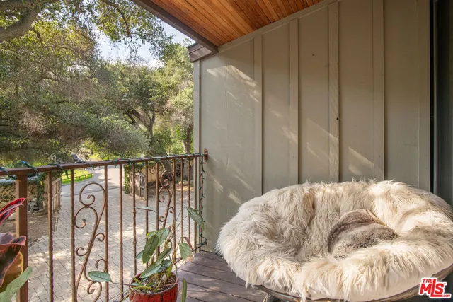 a workspace with furniture and wooden floor