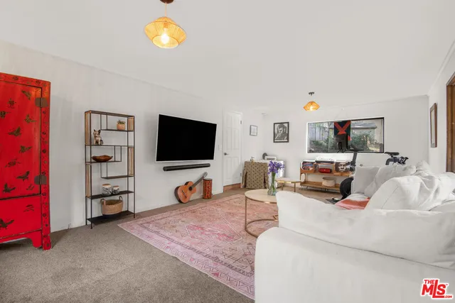 a view of a street with a building in the background