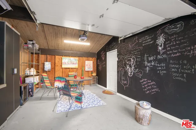 a white refrigerator freezer sitting inside of a kitchen