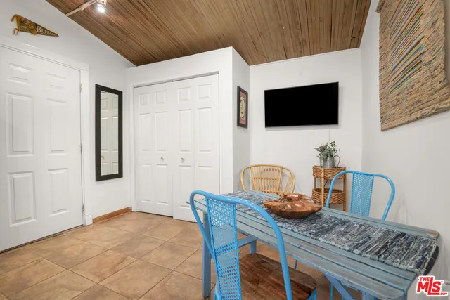 a bathroom with a sink toilet and mirror