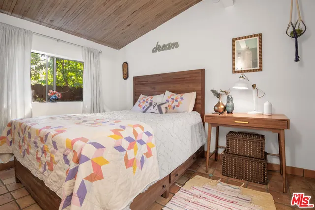 a house with trees in the background