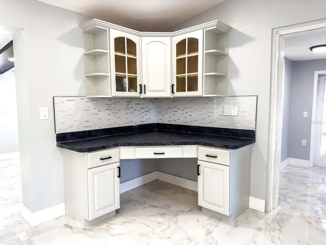 a view of outdoor space and swimming pool