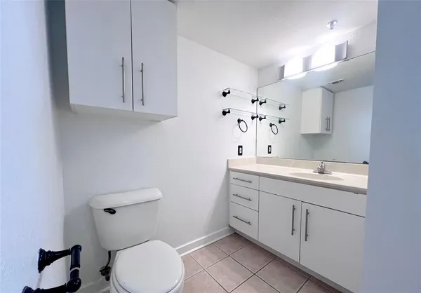 a bathroom with a bathtub and a toilet