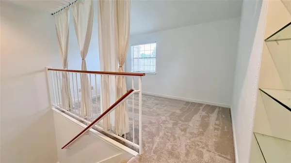 a view of entryway with stairs