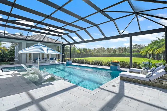 a view of a patio with a table chairs and a table
