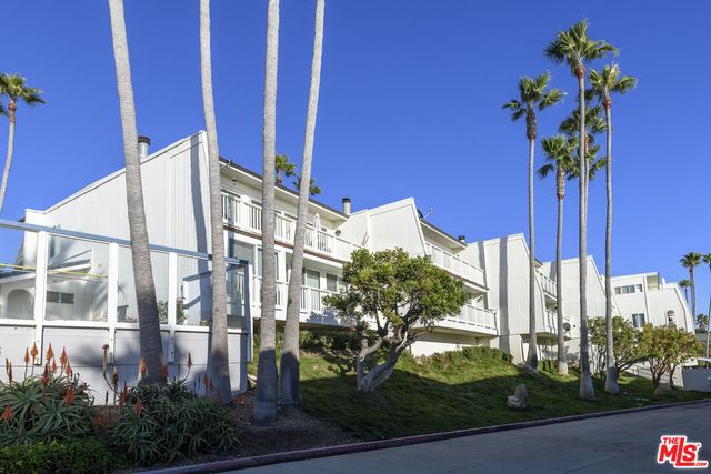 a view of a building with a street