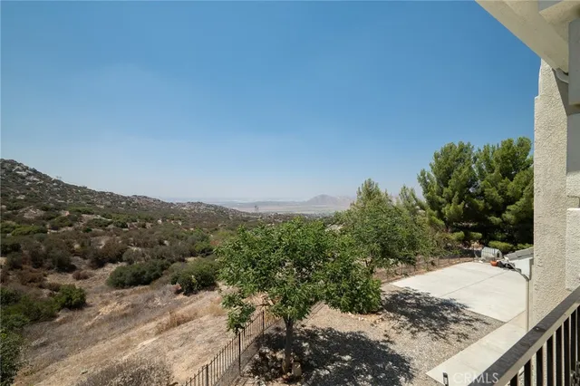 a view of a room with a mountain view