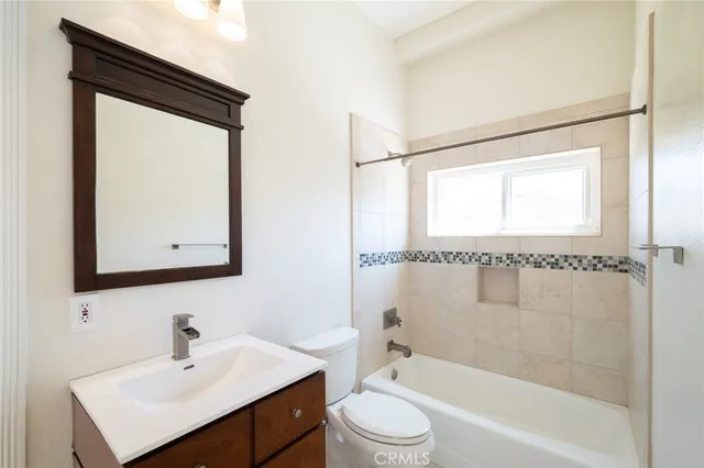 an aerial view of a house with a garden