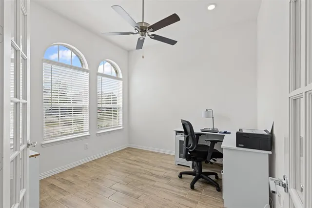 a bathroom with a tub and shower