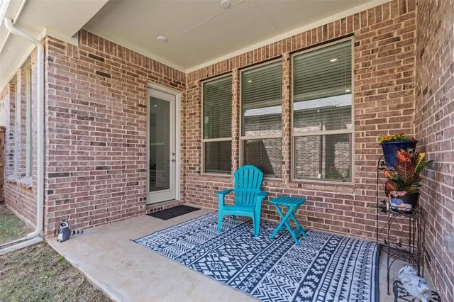 a view of storage and utility room with washer and dryer