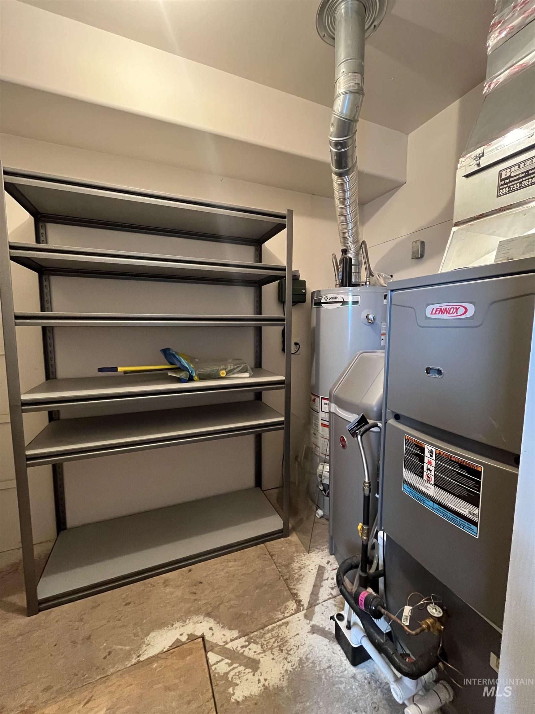 989 O'Leary Way Twin Falls, ID 83301 - Photo 21 of 30 Utilities featuring water heater and heating unit