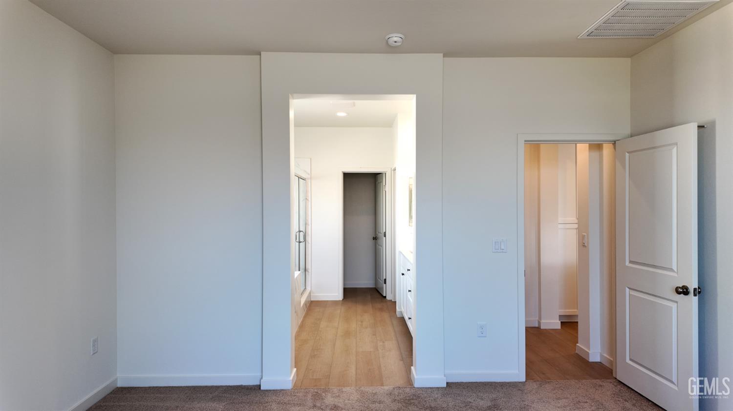 Undisclosed Address Bakersfield, CA 93311 - Photo 14 of 31 a view of a room with wooden floor and closet