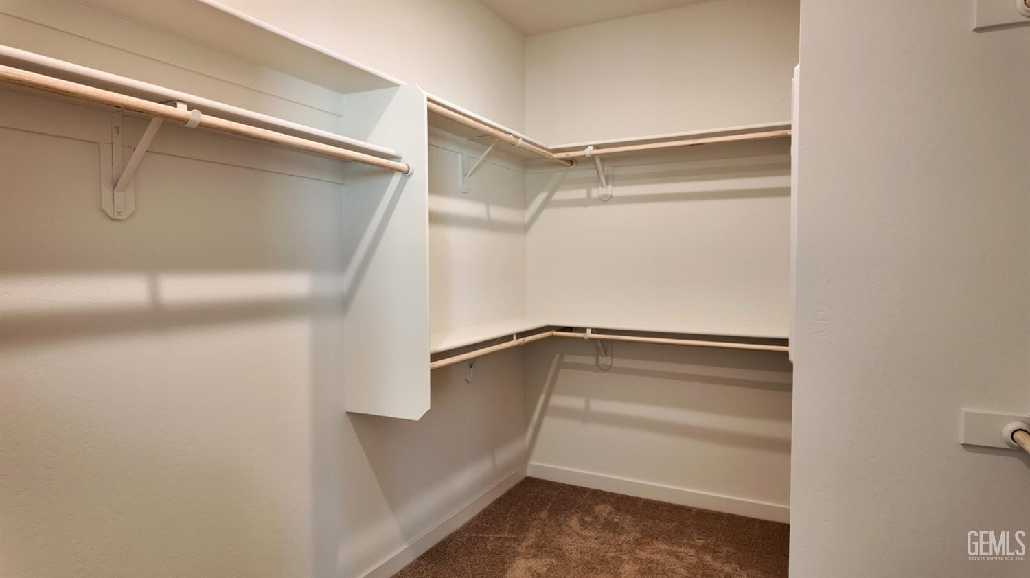 Undisclosed Address Bakersfield, CA 93311 - Photo 17 of 31 a view of walk in closet