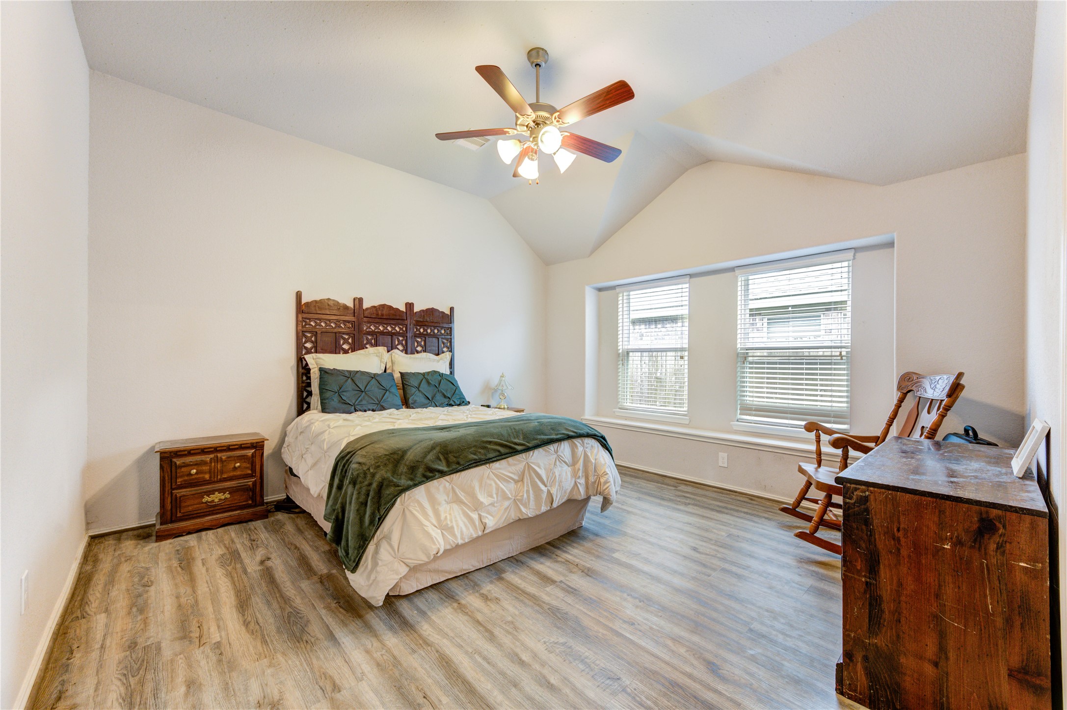 13707 Arcadia Creek Lane Rosharon, TX 77583 - Photo 36 of 47 Spacious primary retreat featuring high ceilings and abundant natural light.