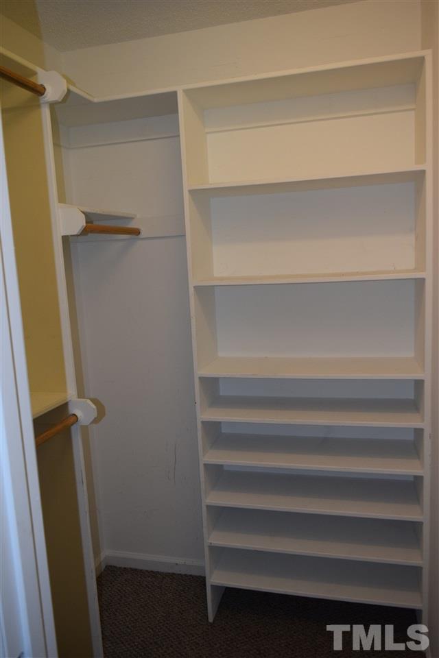6617 Cassam Road Bahama, NC 27503 - Photo 14 of 20 Each closet has built-in shelves for efficient storage.