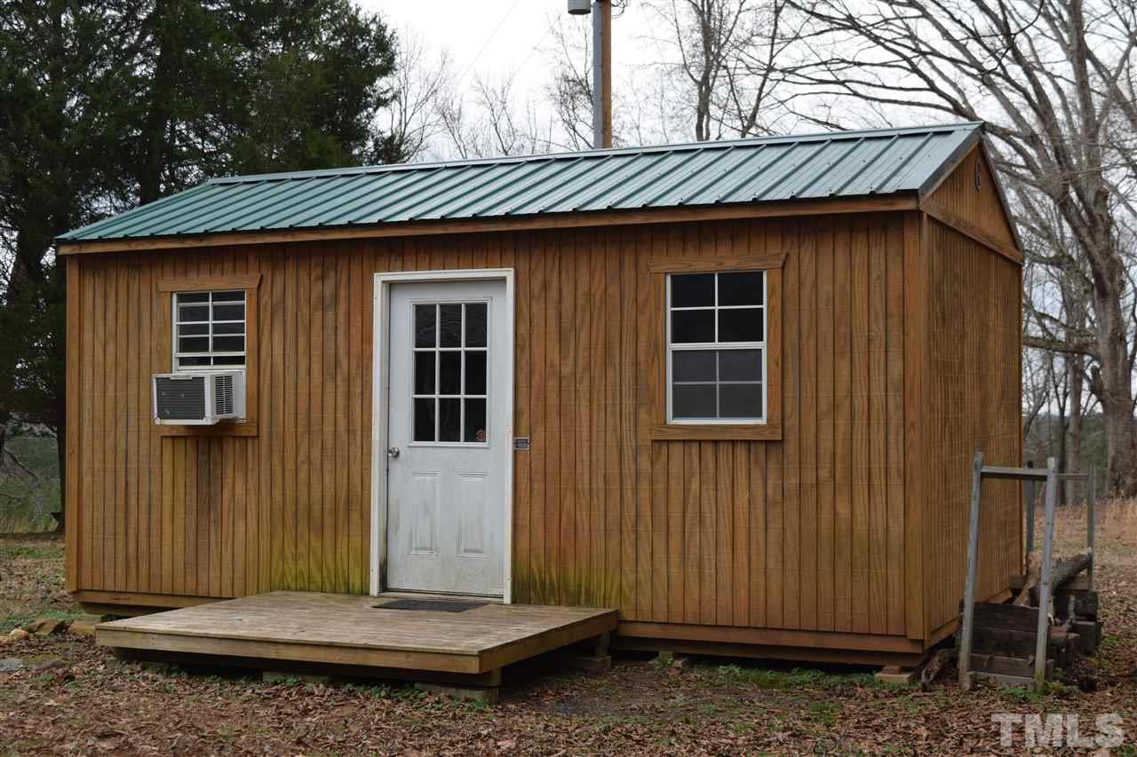 6617 Cassam Road Bahama, NC 27503 - Photo 15 of 20 The workshop has electricity and a window air conditioning unit for pursuing lots of hobbies.
