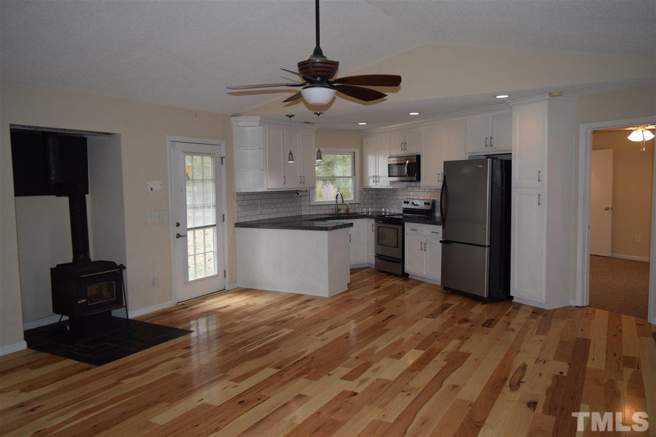 6617 Cassam Road Bahama, NC 27503 - Photo 3 of 20 Open concept great room and kitchen