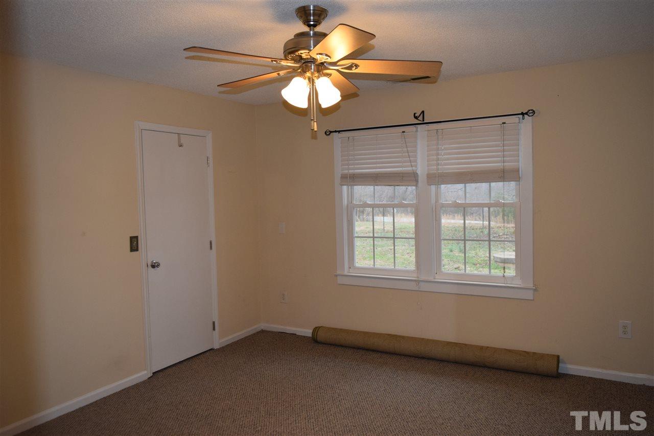 6617 Cassam Road Bahama, NC 27503 - Photo 10 of 20 The bedrooms are similar sizes, but this one would most likely work as a master bedroom.