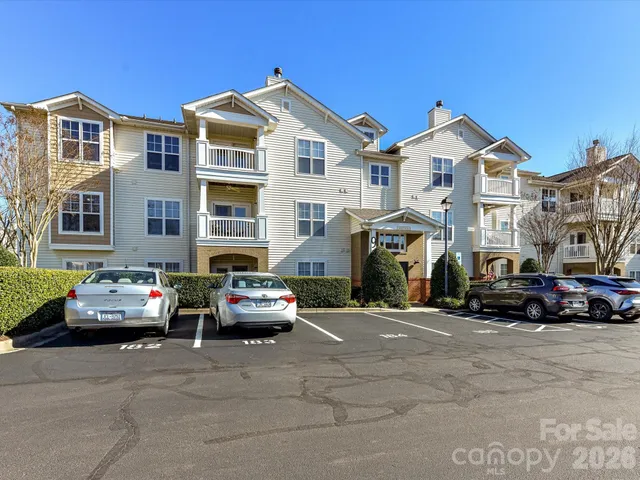 a car parked in front of a houses