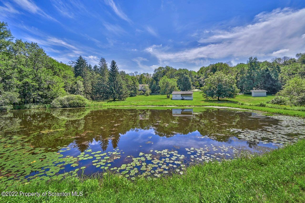 2181 Becks Crossing Road Moscow, PA 18444 - Photo 3 of 70 a view of a lush green field