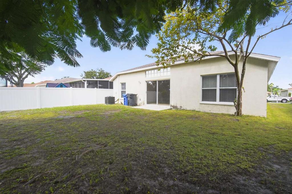 12630 Early Run Lane Riverview, FL 33578 - Photo 13 of 14 a house view with a garden space