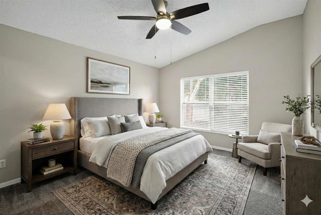 12630 Early Run Lane Riverview, FL 33578 - Photo 4 of 14 a bedroom with bed and a window