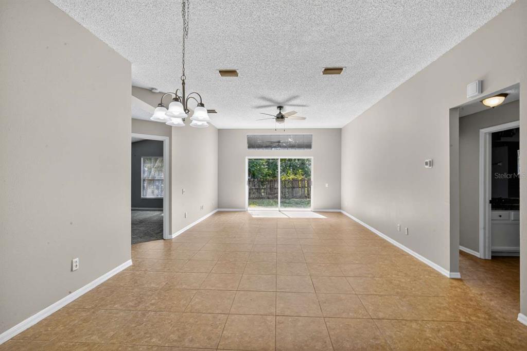 12630 Early Run Lane Riverview, FL 33578 - Photo 6 of 14 a view of an empty room with a window