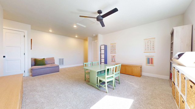1127 4240 North Enoch, UT 84721 - Photo 36 of 56 Loft with light colored carpet, a ceiling fan, and recessed lighting