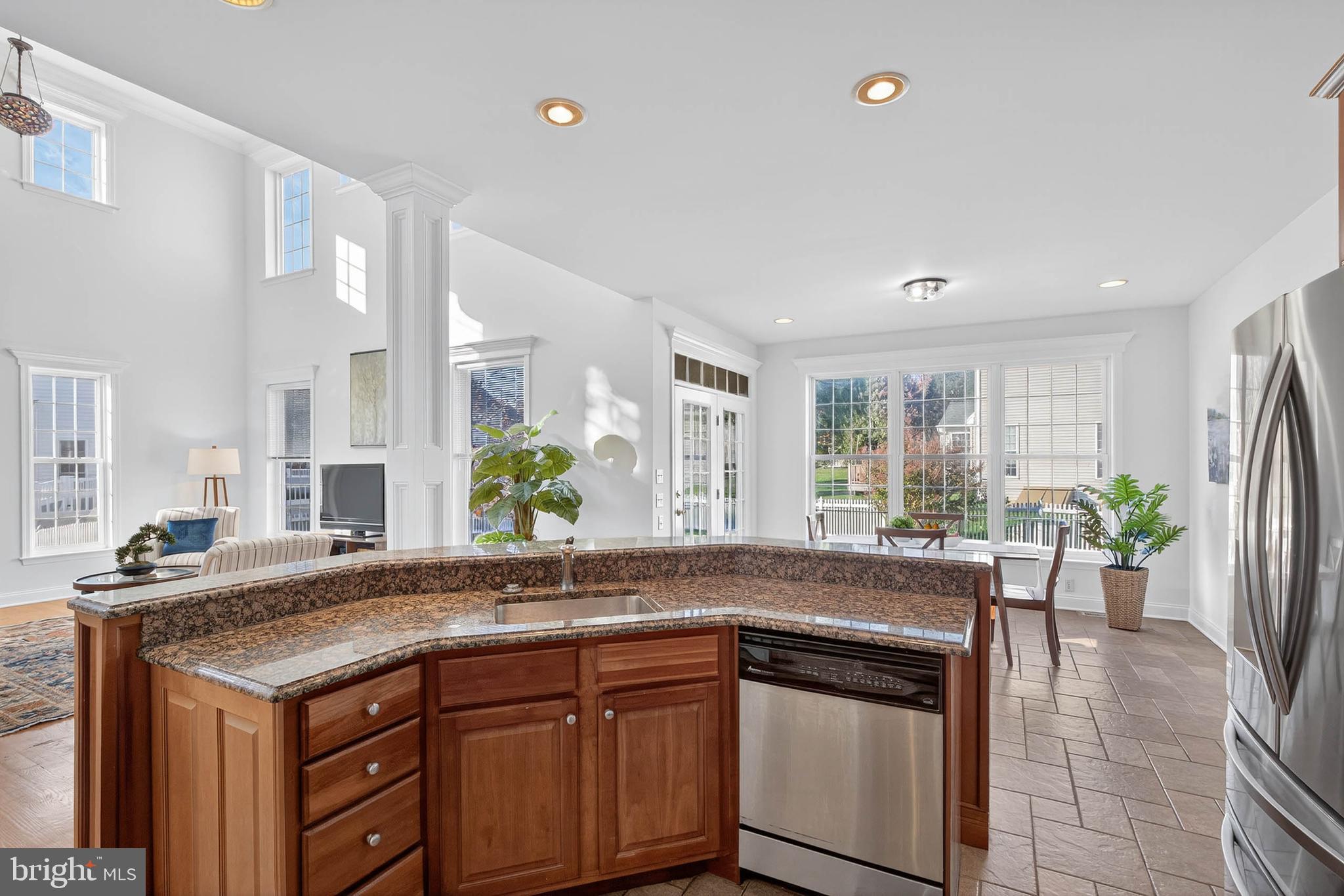 304 Cobblers Court Lititz, PA 17543 - Photo 13 of 50 a kitchen with a sink and stove