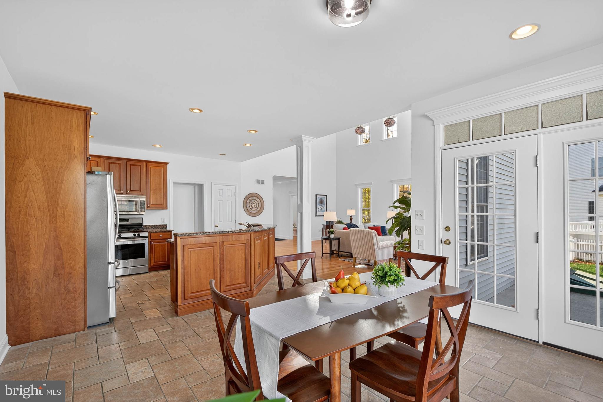 304 Cobblers Court Lititz, PA 17543 - Photo 16 of 50 a view of a dining room with furniture and a livingroom