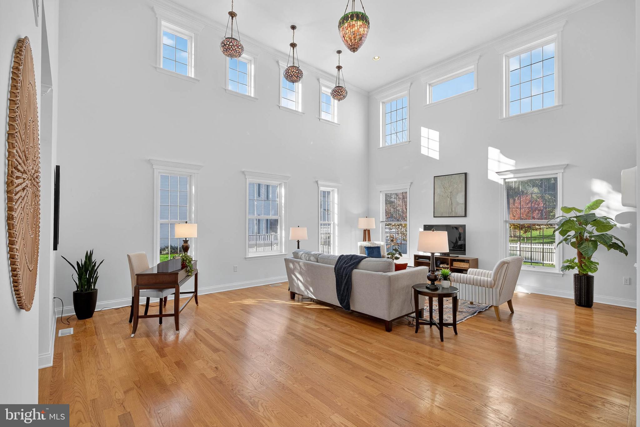 304 Cobblers Court Lititz, PA 17543 - Photo 2 of 50 a living room with furniture and wooden floor