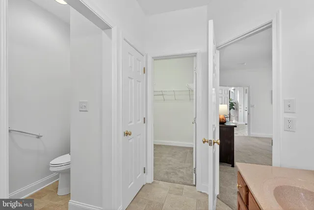 a bathroom with a sink and toilet