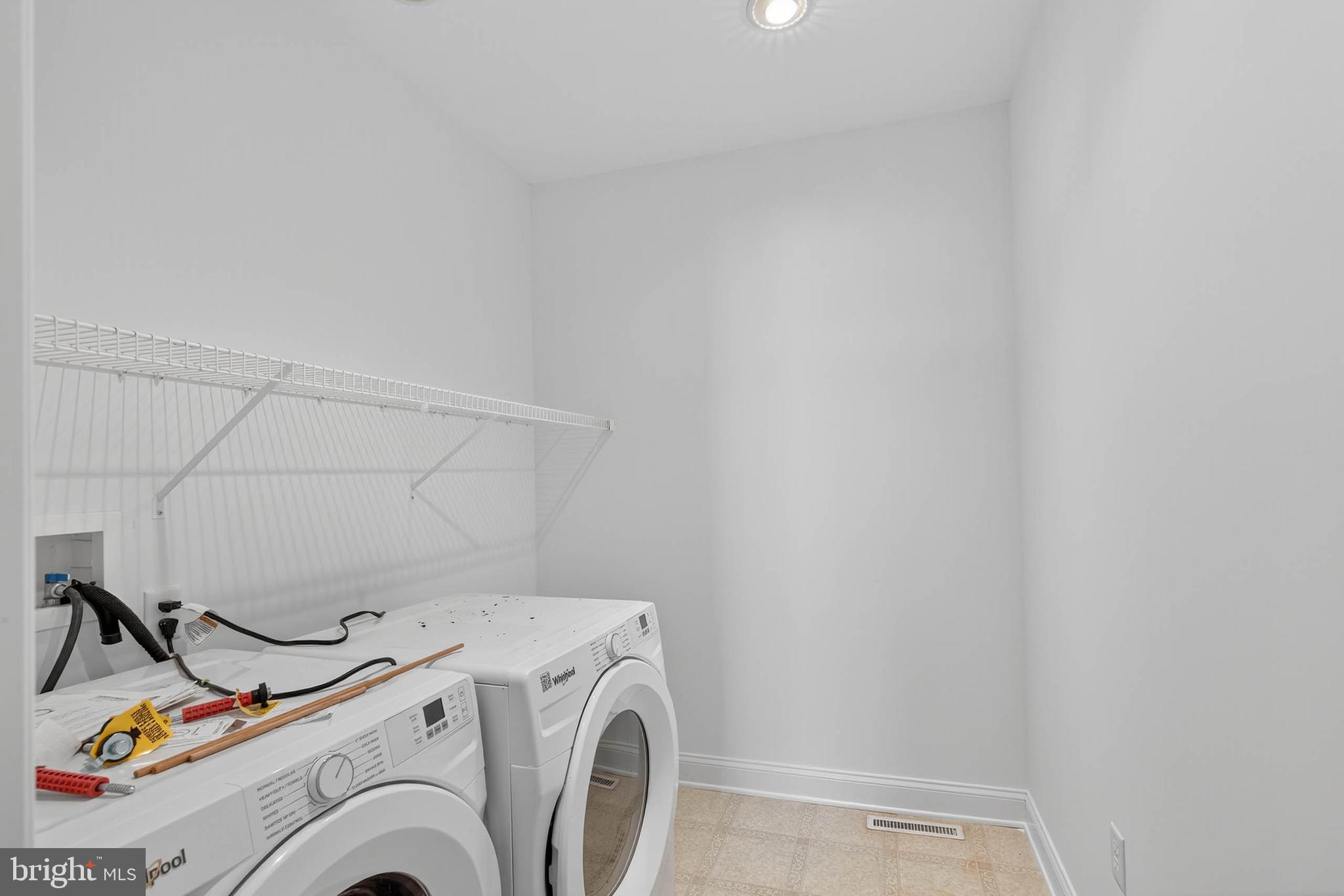 304 Cobblers Court Lititz, PA 17543 - Photo 26 of 50 a utility room with dryer and washer