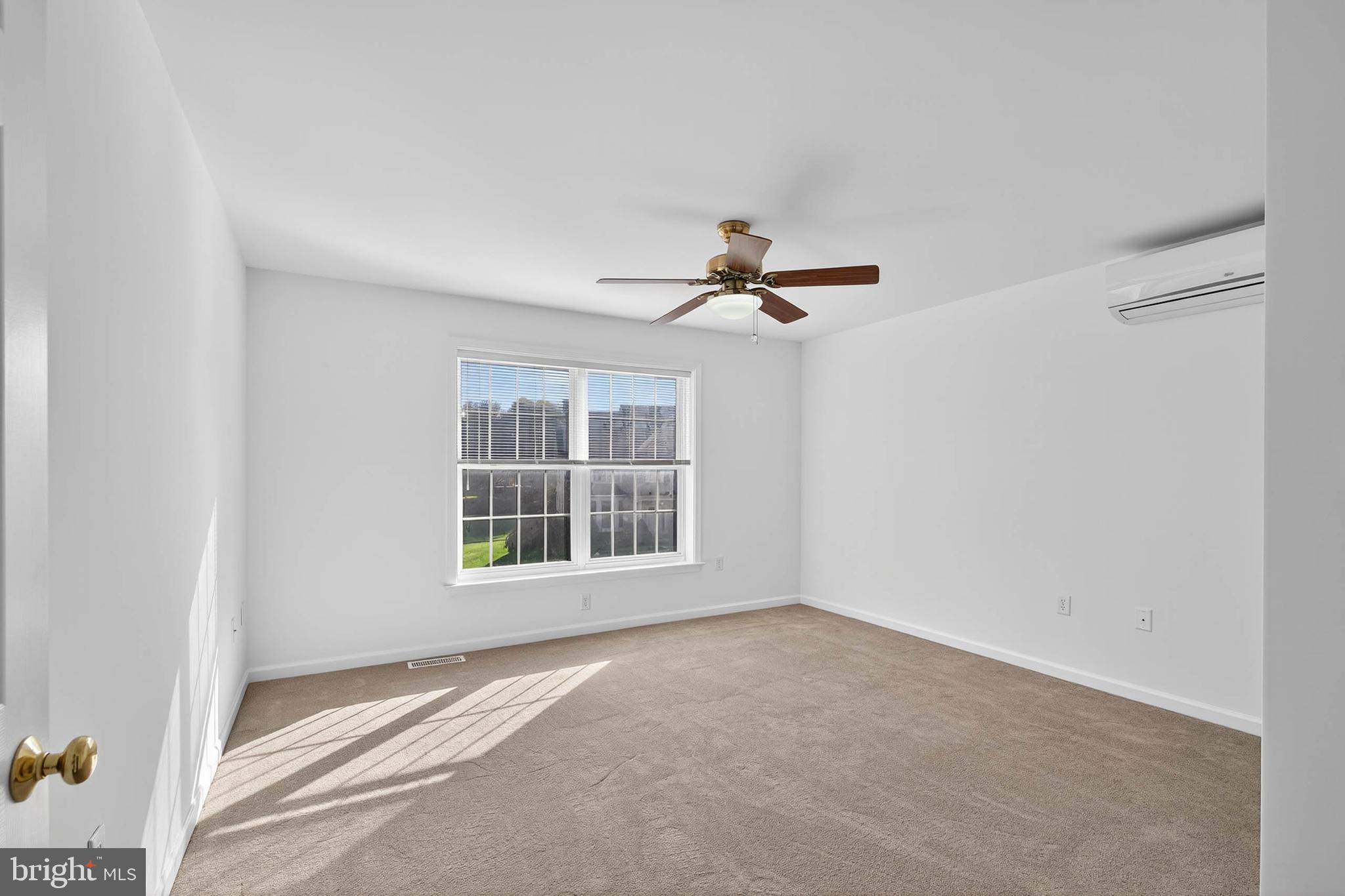 304 Cobblers Court Lititz, PA 17543 - Photo 30 of 50 a view of an empty room with a window
