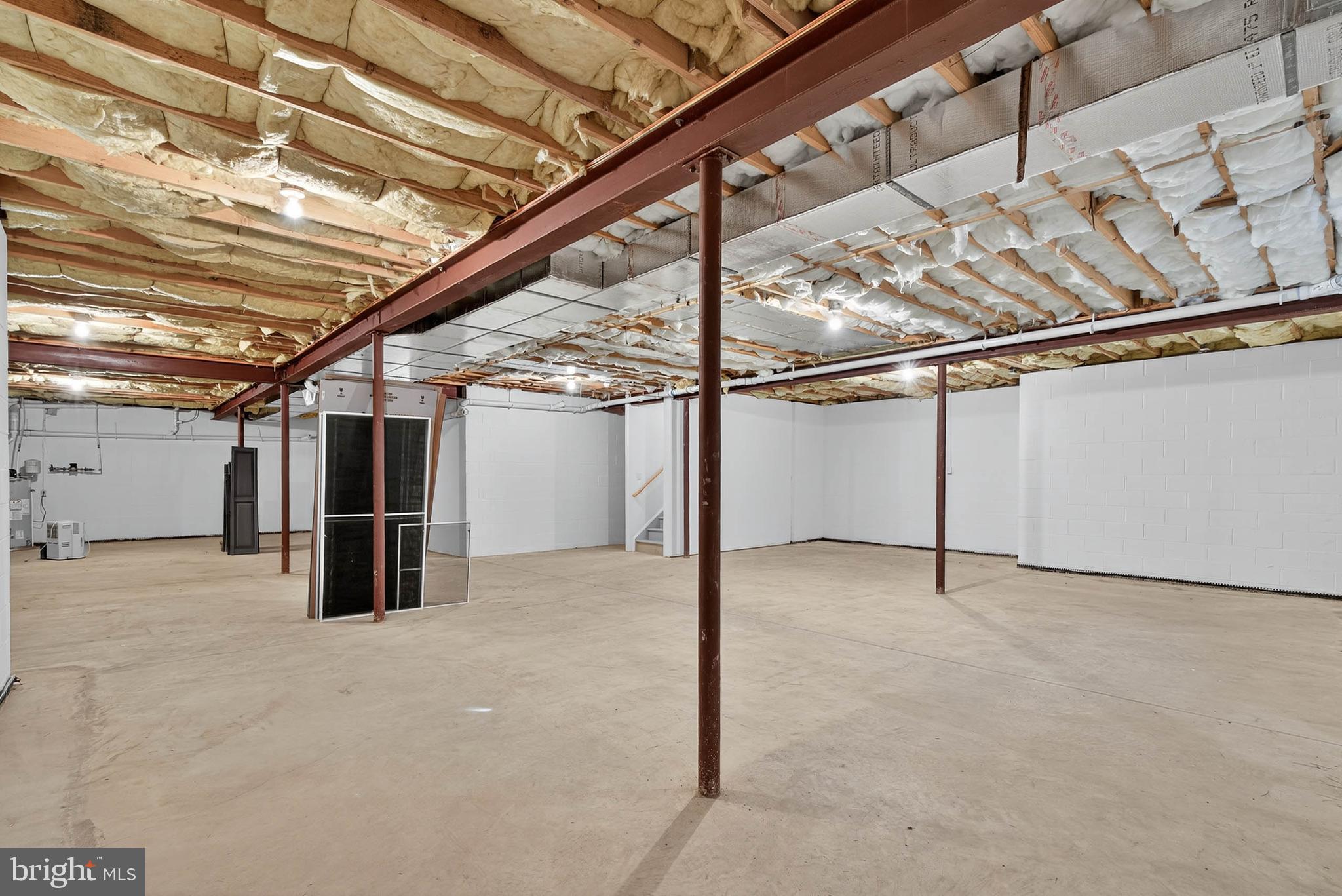 304 Cobblers Court Lititz, PA 17543 - Photo 38 of 50 a view of an empty room with wooden floor