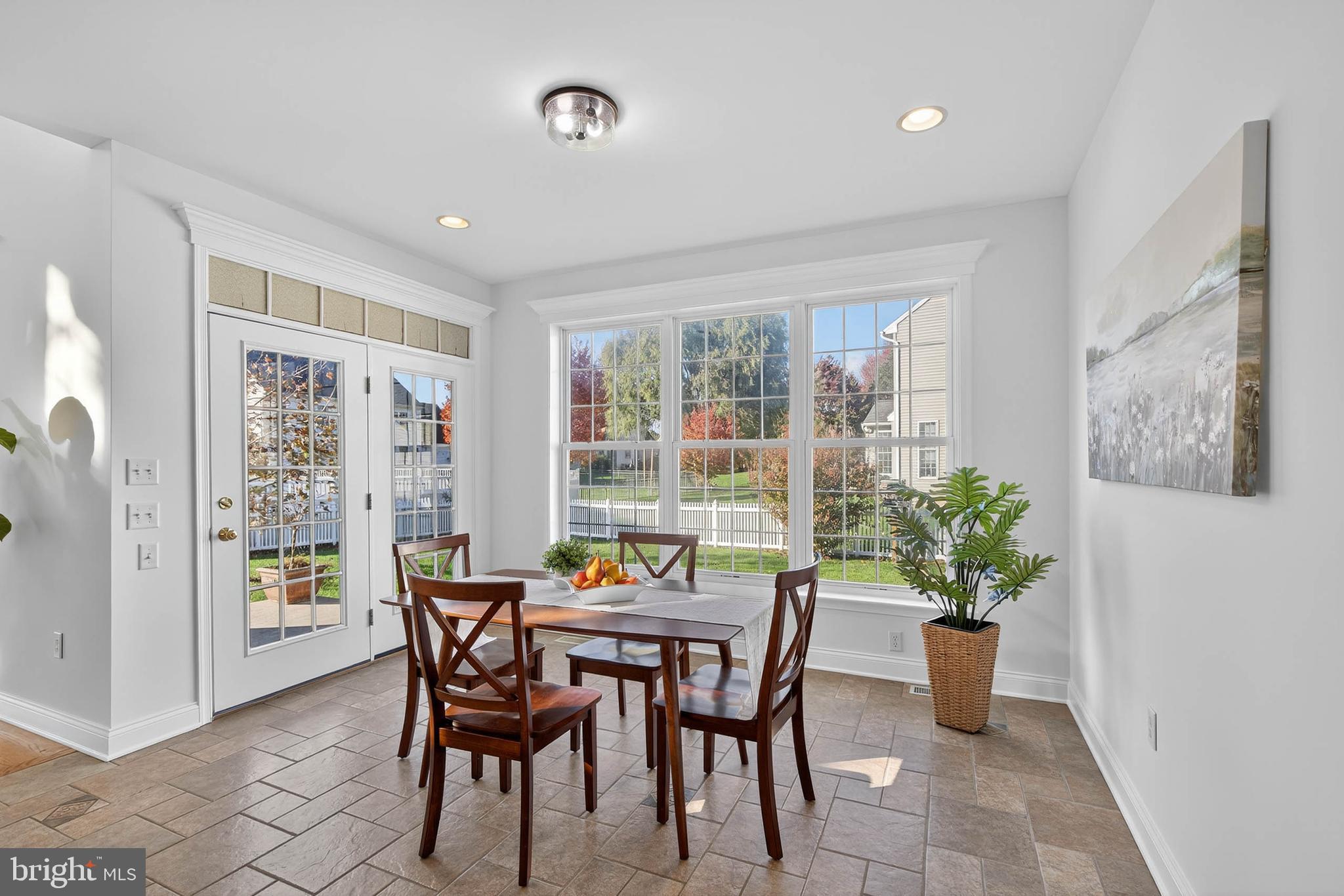 304 Cobblers Court Lititz, PA 17543 - Photo 4 of 50 a dining room with furniture and window