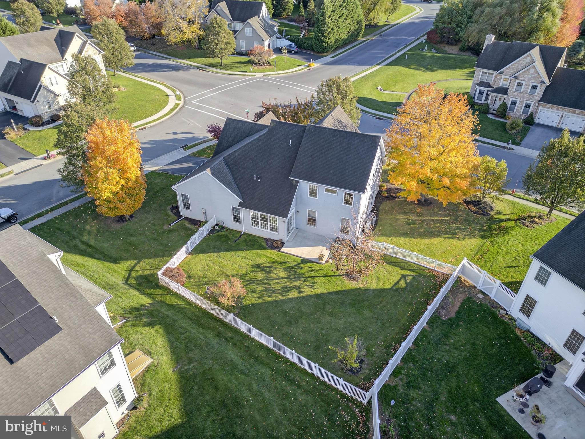 304 Cobblers Court Lititz, PA 17543 - Photo 49 of 50 an aerial view of a house with a garden and swimming pool