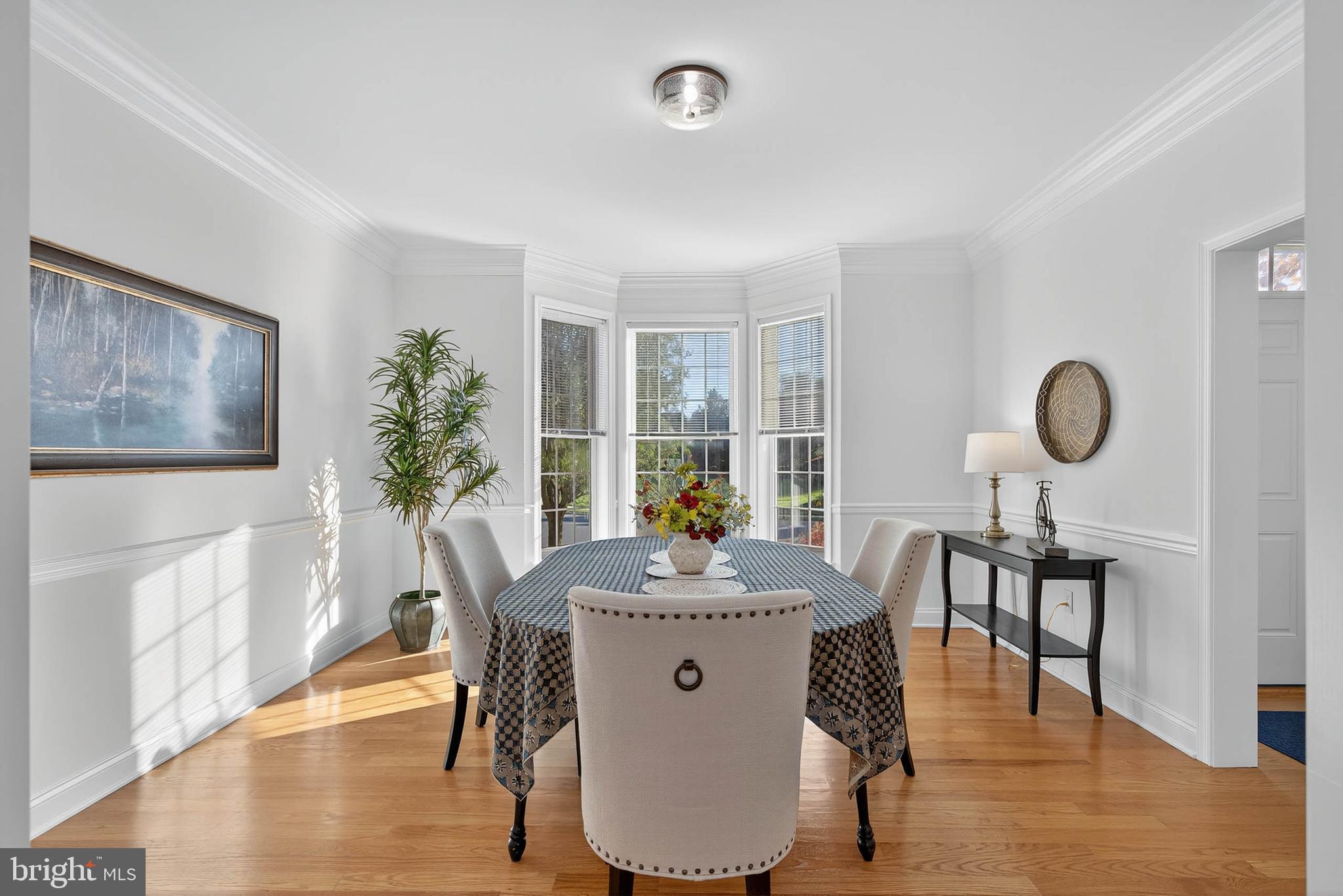 304 Cobblers Court Lititz, PA 17543 - Photo 5 of 50 a dining room with furniture window and wooden floor