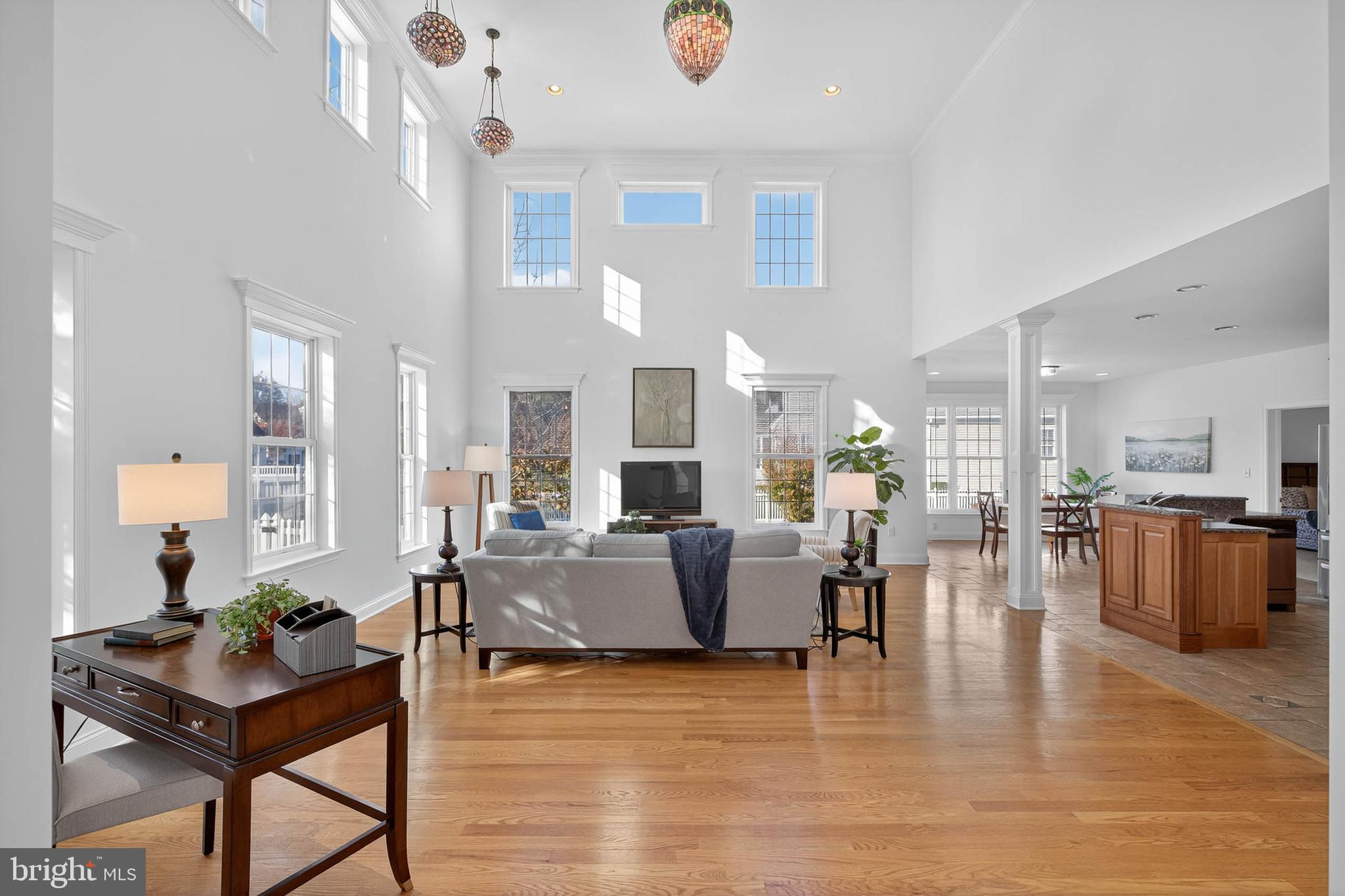 304 Cobblers Court Lititz, PA 17543 - Photo 8 of 50 a living room with fireplace furniture and a wooden floor