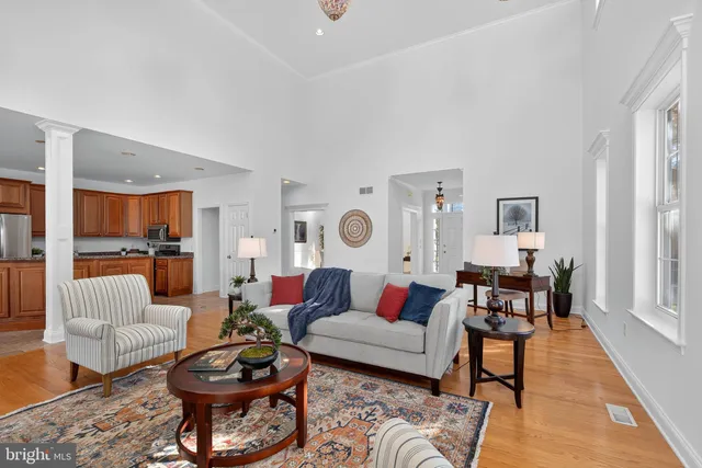 a living room with furniture and a rug